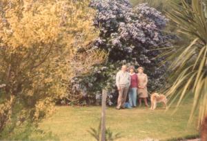 Mum Dorothy Trevor and Dog Pat in a formal garden