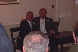 Mark & Chris Signing ArmRoundShoulder